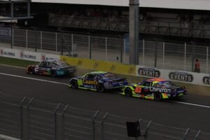 High-speed NASCAR race action on track in Mexico City, capturing intense competition.